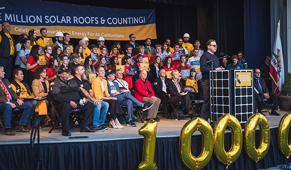 Rick Brown speaks at the One Million Solar Roofs and Counting celebration, December 2019
